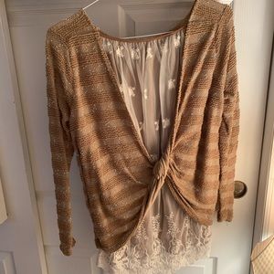 Oversized sweater-cute detail on back!